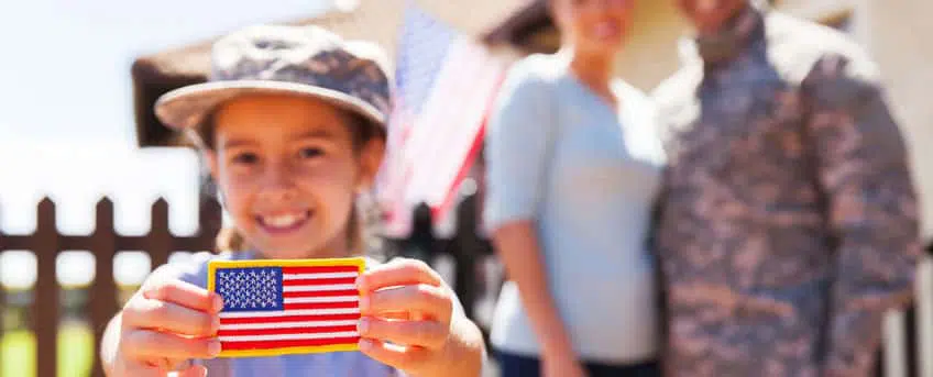 girl holding an america flag