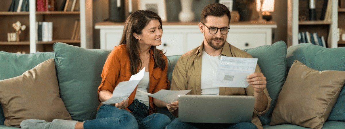Young first time Homebuyers Looking at bills